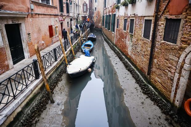 Venice experiences draught, canals dry up.