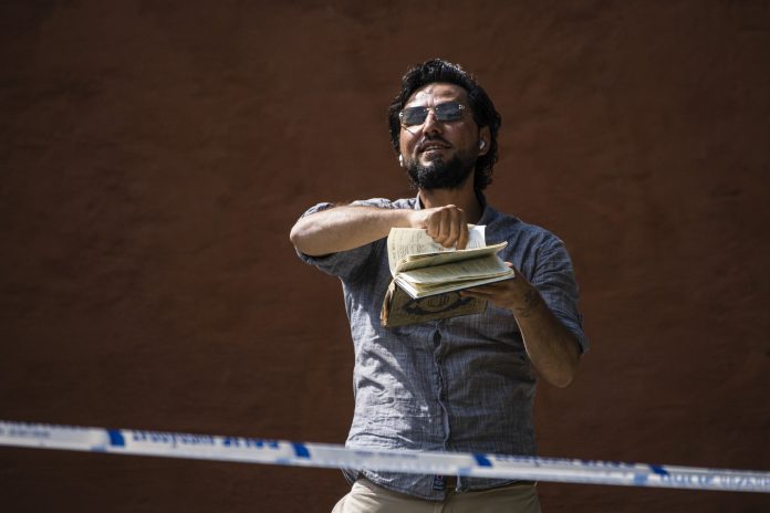 Man tears up, burns Quran outside mosque on Eid holiday in Sweden